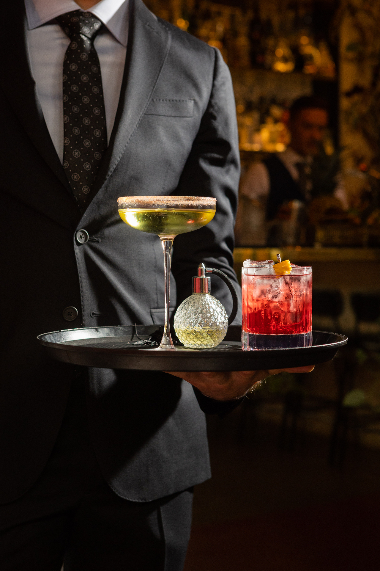 Vassoio con tre cocktail